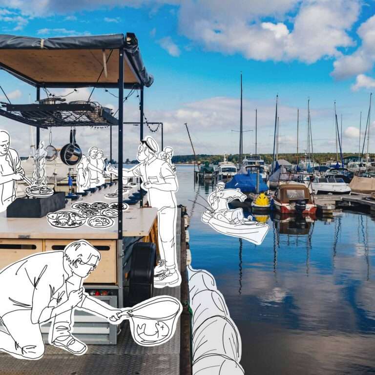 Hafen mit Koch und Booten.